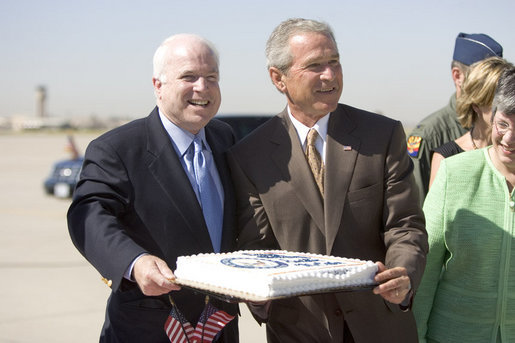 President Bush and John McCain eat cake while New Orleans drowns